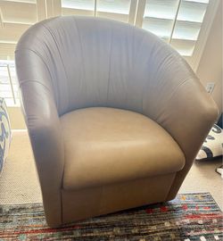 Pair of Natuzzi Leather Swivel Barrel Chairs