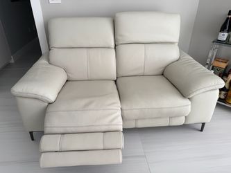 Cream leather power loveseat and sofa