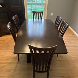 Table, Chairs, And China Cabinet 