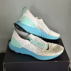 Nike React Vision trainers in white and blue mens 14