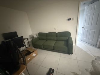 Three seater sofa, like new.