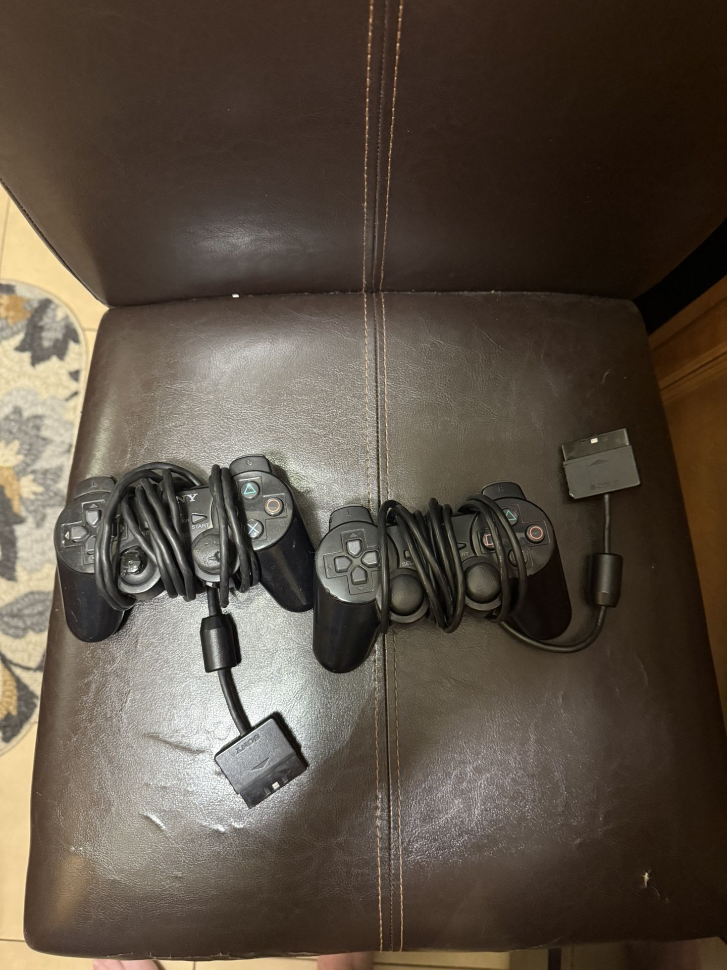 Two OG PS2 Remotes