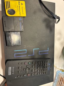 Ps2 with 8 games and remote SIM cards no remote 80.00