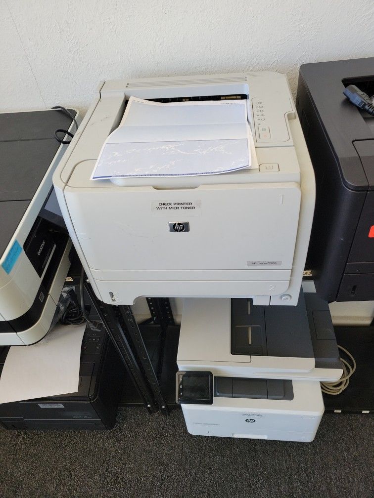 CHECK PRINTER WITH MAGNETIC TONER