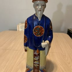 Porcelain Figurine Of A Chinese EmperorFrom The Qing Dynasty