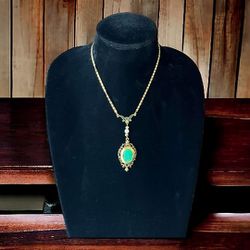 Vintage signed ART Arthur Pepper faux jade locket necklace with Enamel & Faux Pearl Accents Locket Dangle is 3” on 16” Gold Tone Chain 
