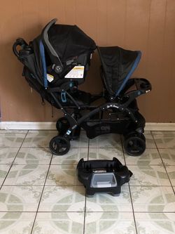 BABY TREND SEAT AND STAND DOUBLE STROLLER WITH CAR SEAT!!!!!