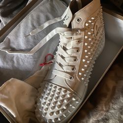 Christian Louboutin High-top red bottoms