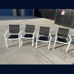 Four brand new patio chairs for $180