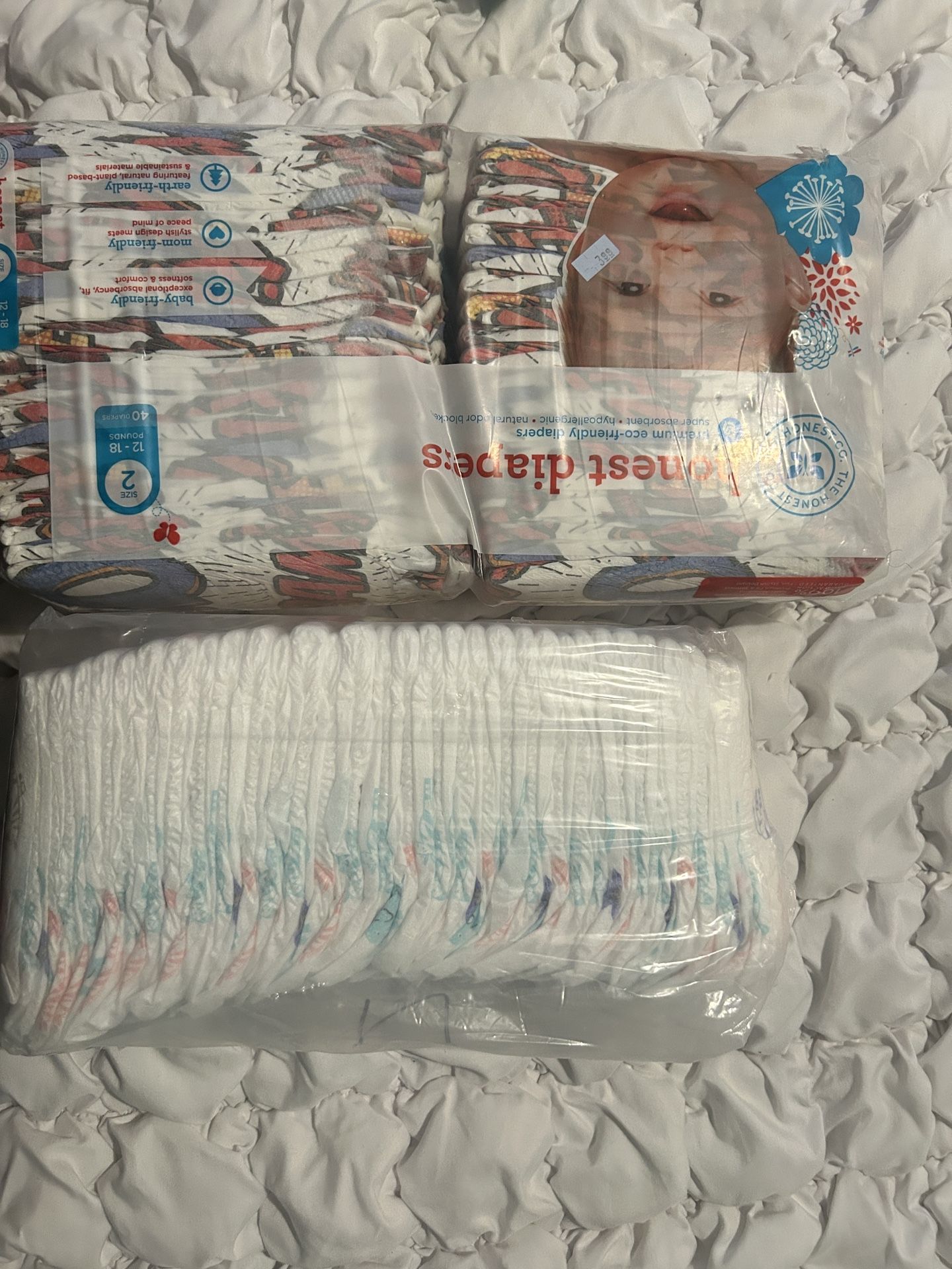 1 pack newborn diapers and Size 2 diapers.
