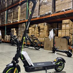 Front and rear shock-absorbing electric scooters