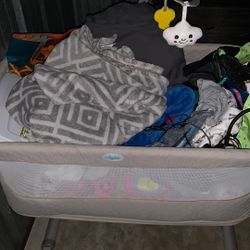 Baby Crib Fill With Random Baby Things