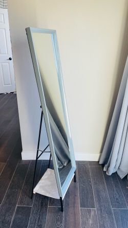 Full length mirror with hooks on the back