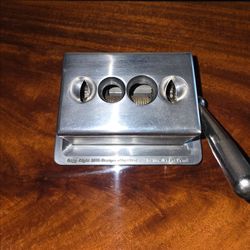 Quad tabletop cigar cutter.