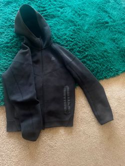 Black Nike tech jacket