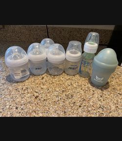 ALL THESE BABY BOTTLES FOR 10$