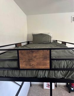 Metal frame twin bunk bed with attached stairs & mattress