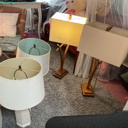 Two Nice Pairs Of Lamps, One Pair Is White Looks Like Bottles.  The Other Pair One Of The Shade Has Some Marks That Can Be Removed (NO SHIPPING)