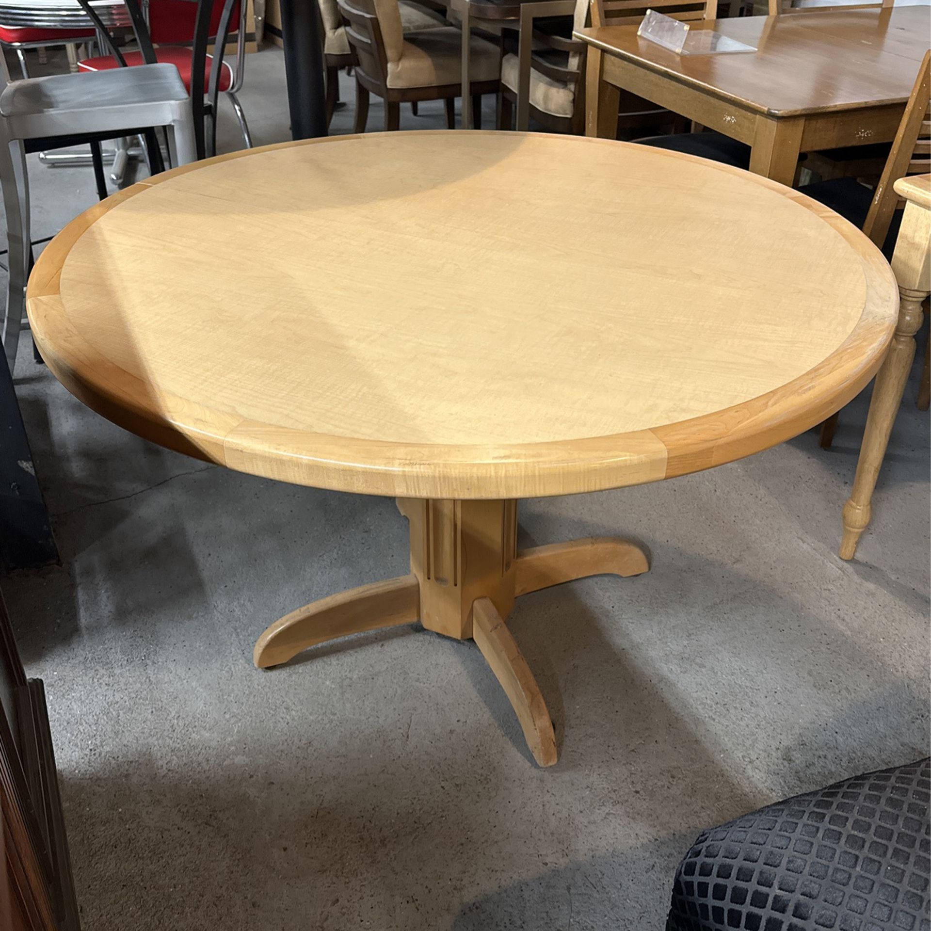 Natural solid, maple with Formica Center 48 inch round table