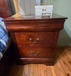 Queen size sled bed with 2 nightstands