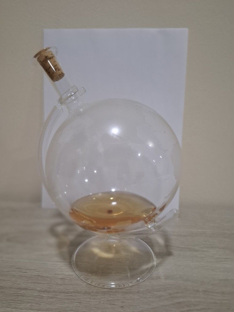 Twirlable Glass Globe Liquid Container with etched World Map