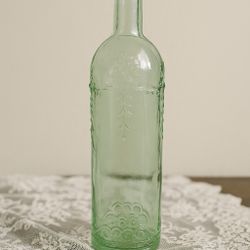 Vintage 1960s Green Glass Bottle Floral & Garland Embossed, 12”
