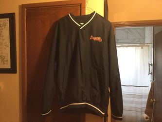 Braves windbreaker size medium/adjustable. Never Worn