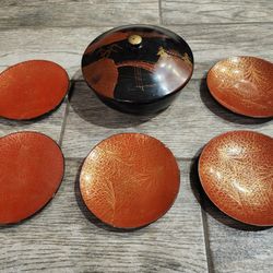 Set of Japanese paper mache lacquered plates and dish with lid
