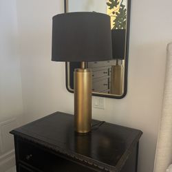 Restoration Hardware Column Table 	Lamp •	Base Overall: 5" diam., 30"H •	Weight: 21 lbs. Lacquered Burnised Brass with linen black shade  Original pri