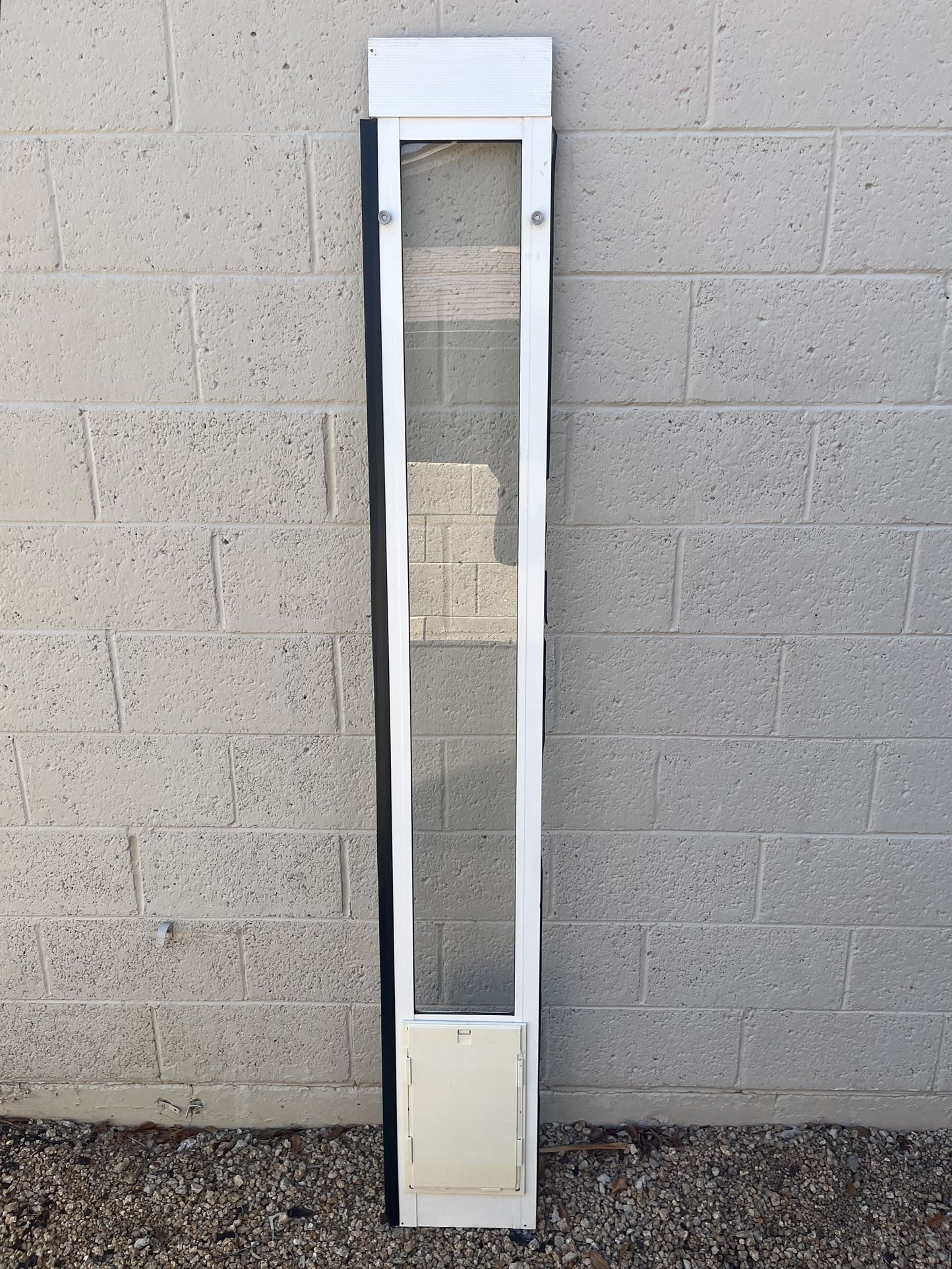 Sliding patio dog door