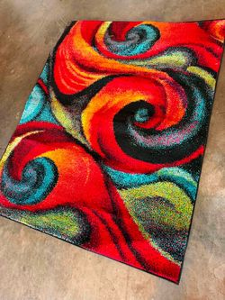 One brand new condition 4/6ft area rug
