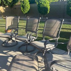 5 Swivel Chairs With Two  Stools/ No Table