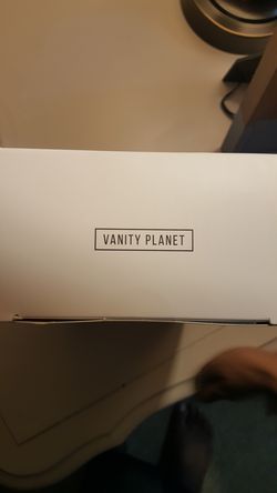 vanityplanet face brush. comes with 3 headbrushes
