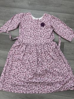 Girls size 12 pink flowers dress with zipper and tie back belt very soft and breathable used once 