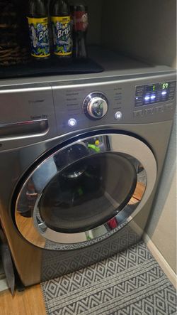 Black LG true steam washer and dryer