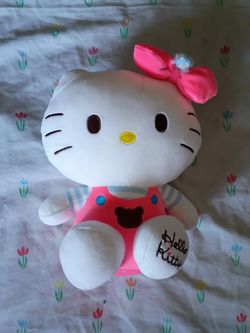 Hello kitty slippers and plushies