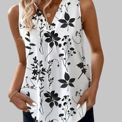 Please see Chart for size before ordering.


New Large Women's Flower Tank Tunic Style Blouse.  Dress up or dress down. 


Beautiful and Comfortable w