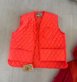 Hunting Vest by Duck Bay New & Orange/red Puff Jacket Used and a Yellow throw on Vest New