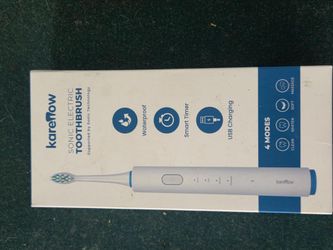 Brand New Sealed Sonic Electric Toothbrush