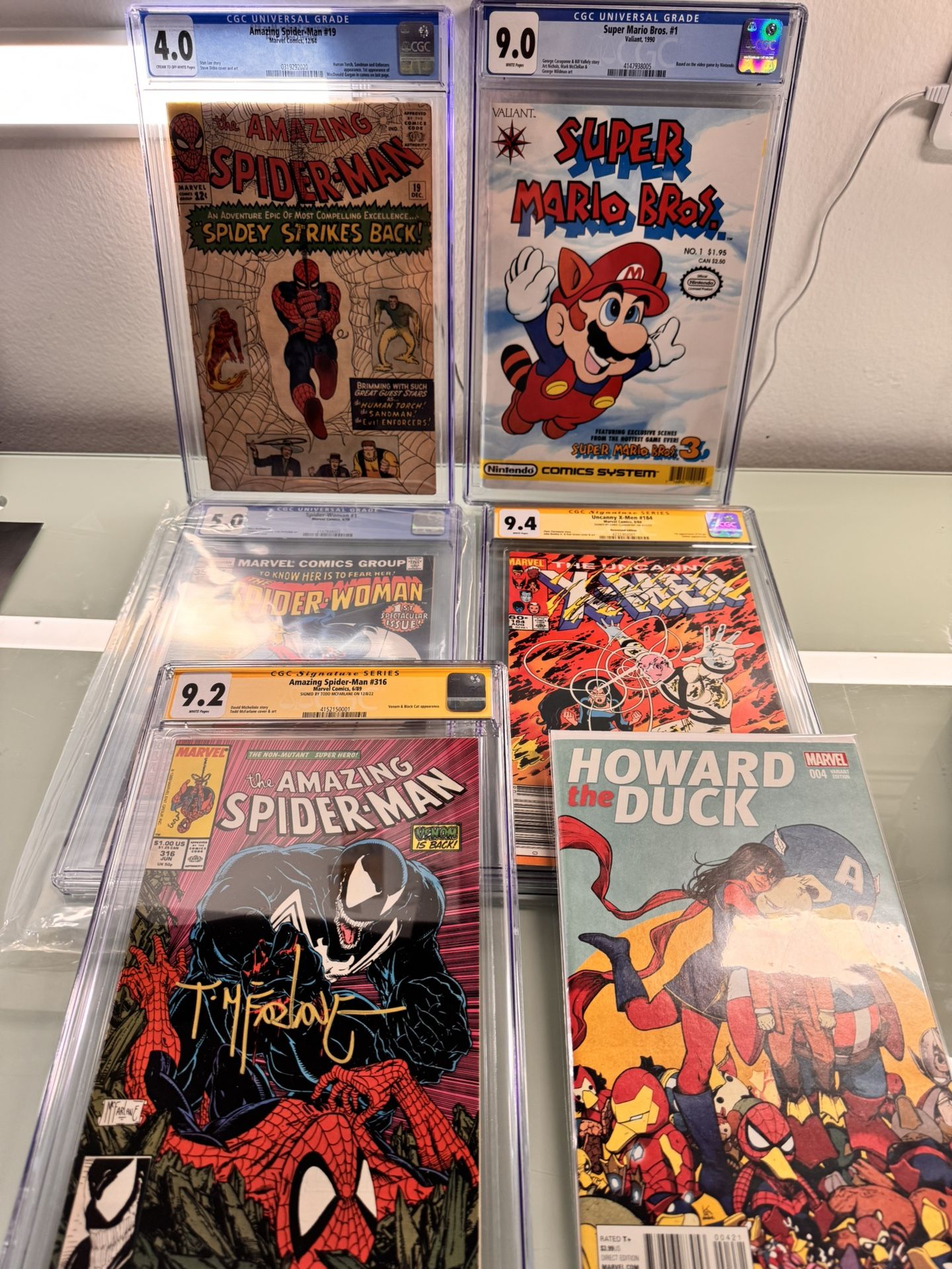 Comic Books Graded Book And One Raw No Trades