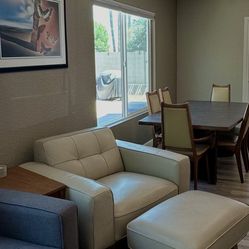 Beautiful Leather Chair And Matching Ottoman