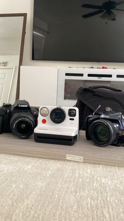 Polaroid and digital cameras
