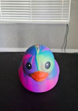 Rainbow Tie-Dye Duck squeezezy stress toy authentic brand new i want $7 dollars brand new still got tags