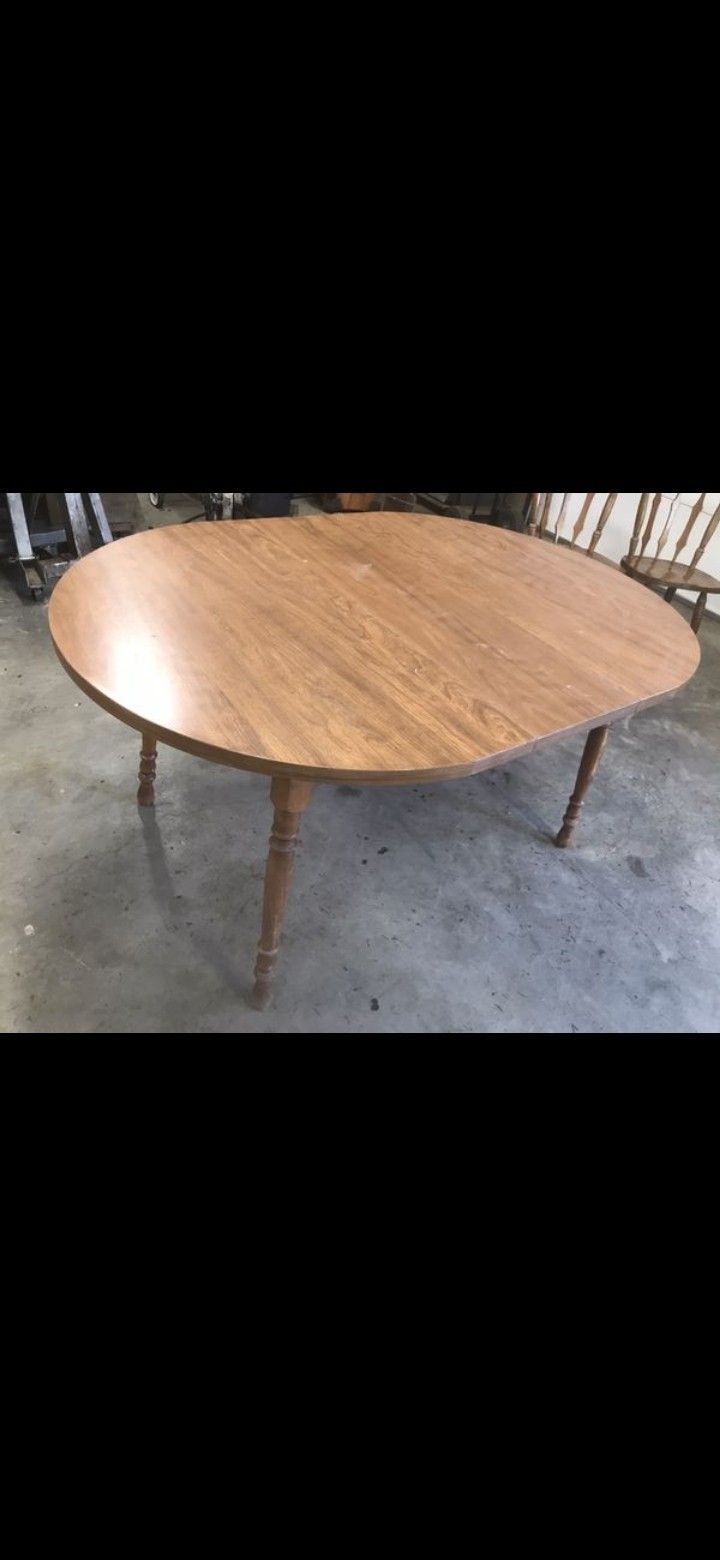 (GOOD STURDY DINING TABLE)NEED GONE