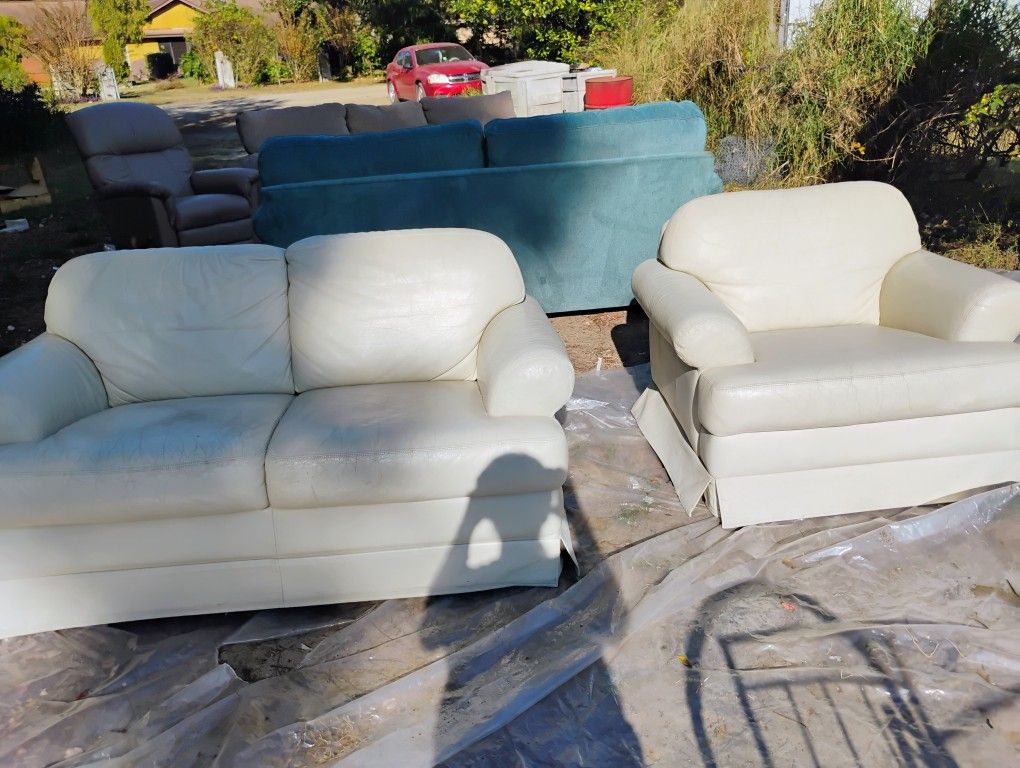 Leather Loveseat And Oversized Chair $70Delivery Availably