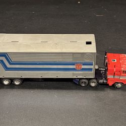 Transformers G1 Vintage Leader Optimus Prime. 1 Takara Japan. Age & play wear. Tires rough. Semi smokestacks loose. Claw broken in trailer. St