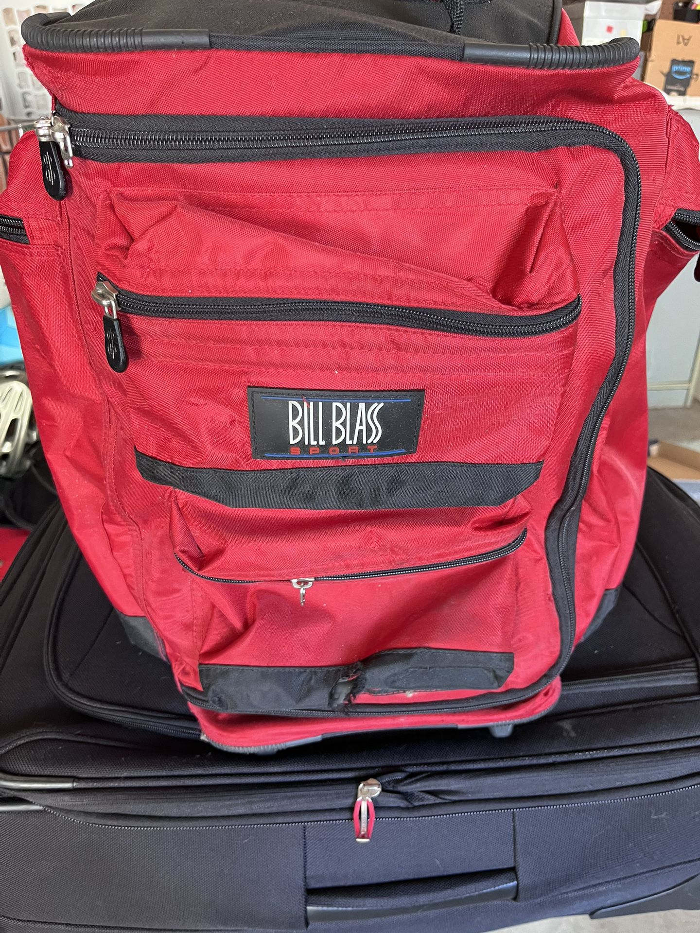 Bill Blass Red Rolling Carry On Bag