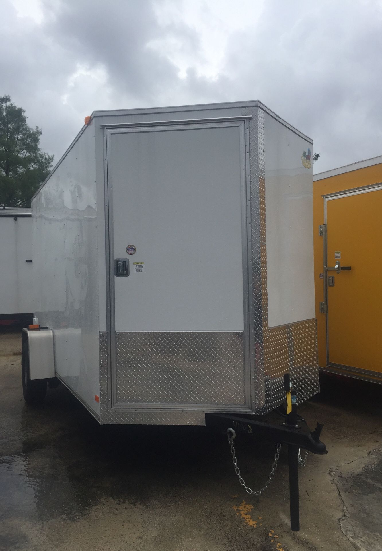 6x12 enclosed v nose cargo / motorcycle / lawn trailer / door in front / 5 year warranty