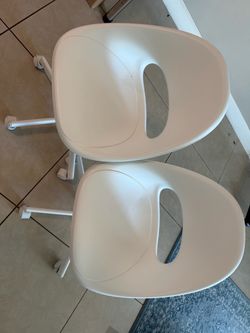 White Plastic Swivel Chairs – Set of 2