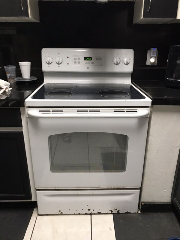 GE white Glass top stove for Sale in Tampa, FL OfferUp
